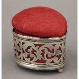 A silver mounted heart shaped sewing box. 5.5 cm wide.