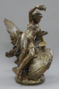 A bronze model of a girl and bird, signed. 54.5 cm high.