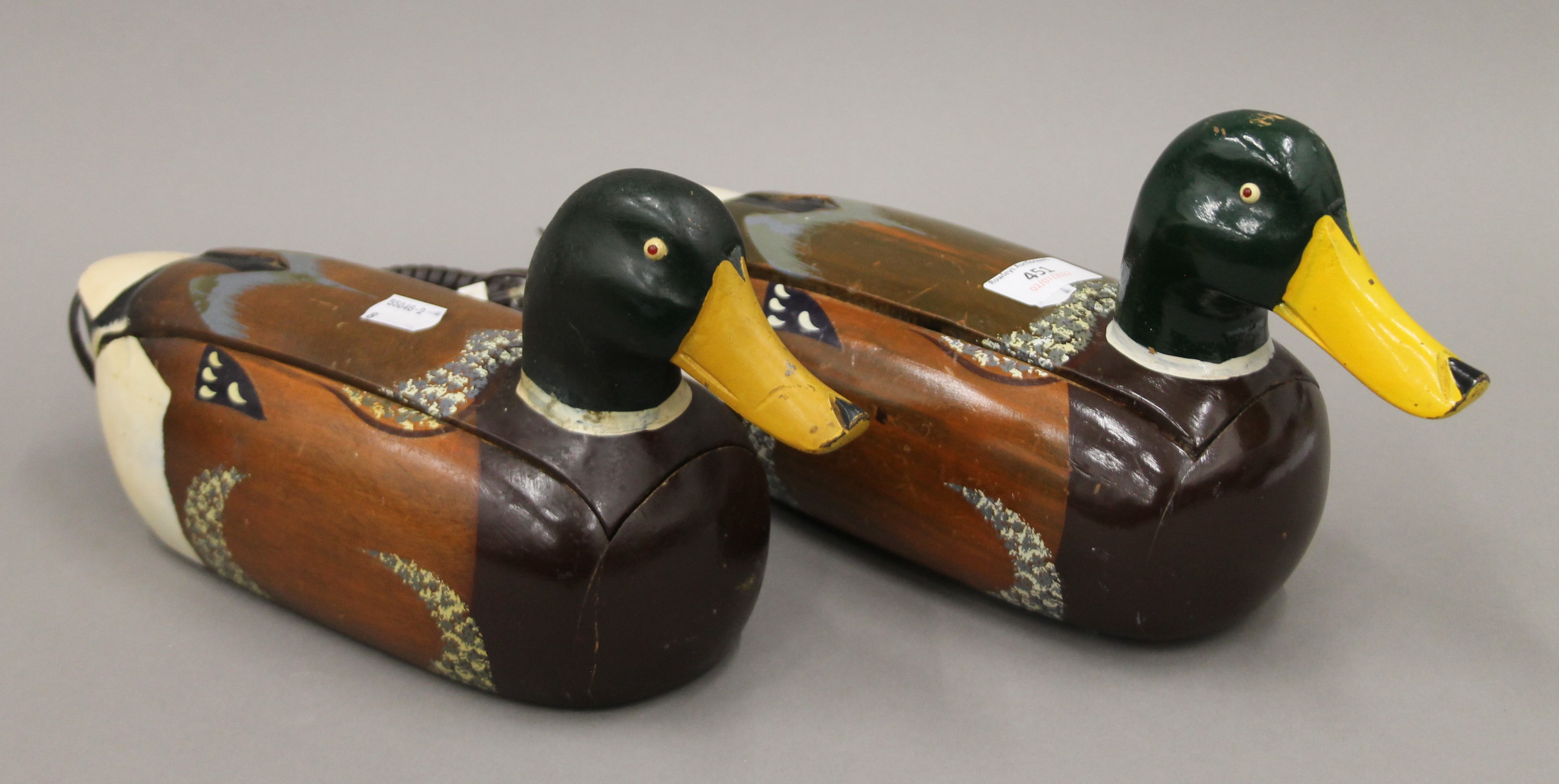 Two duck form telephones.