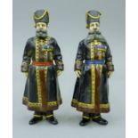 A pair of cold painted figures of Russian soldiers. 18 cm high.