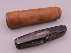 A Georgian tortoiseshell multi blade pocket knife, with one silver blade. 9 cm long.