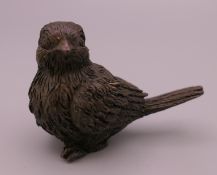 A bronze model of a bird. 4 cm high.