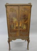 A Virnis Martin style painted cupboard. 115.5 cm high x 50 cm wide.