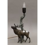 A table lamp formed as a deer. 44 cm high overall.