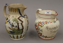 A Prattware jug and a jug inscribed Success to the Coal Trade. The former 19.5 cm high.