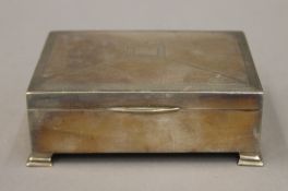 A silver cigarette box. 13 cm wide. 305.7 grammes total weight.