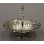 A silver bon-bon basket. 15 cm long. 143.3 grammes.