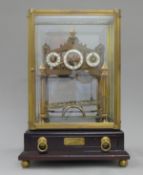 A congreve clock. 39.5 cm high.