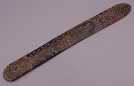 A carved baleen stay busk. 32.5 cm long.