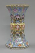 A Chinese hexagonal coloured porcelain vase. 24 cm high.
