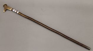 A walking stick, the antler handle set with a whistle. 96 cm long.