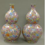 A pair of Chinese millefiori double gourd vases. 65 cm high.