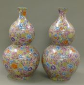 A pair of Chinese millefiori double gourd vases. 65 cm high.
