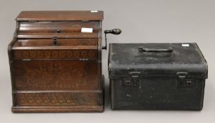 A Melodia Roller Organ with collection of paper spools. 30 cm wide.