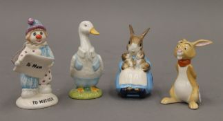 Three Beswick figures and one Royal Albert figure.