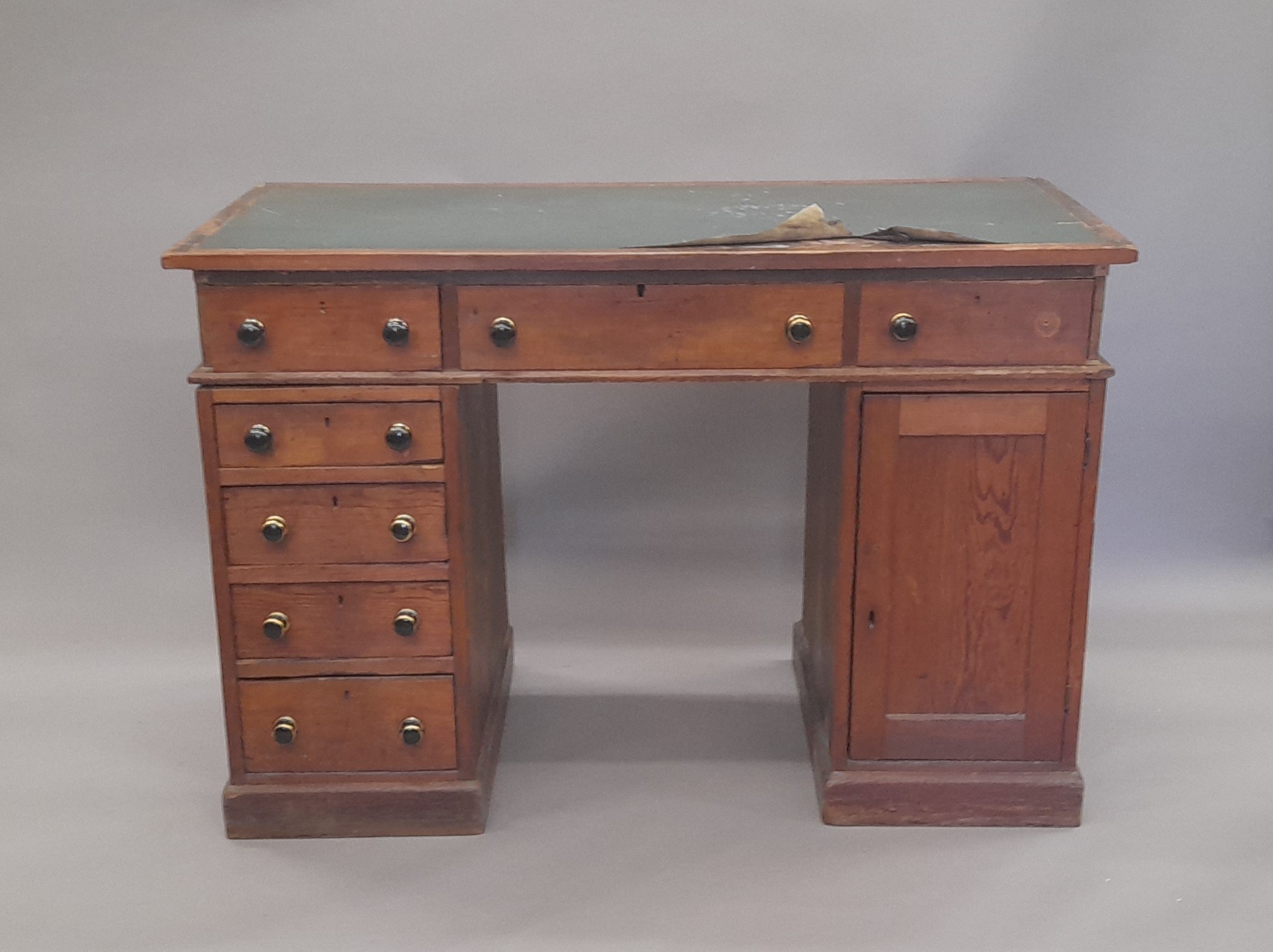 A Victorian pine pedestal desk. 118.5 cm wide.