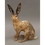 A Winstanley porcelain model of a hare. 38 cm high.