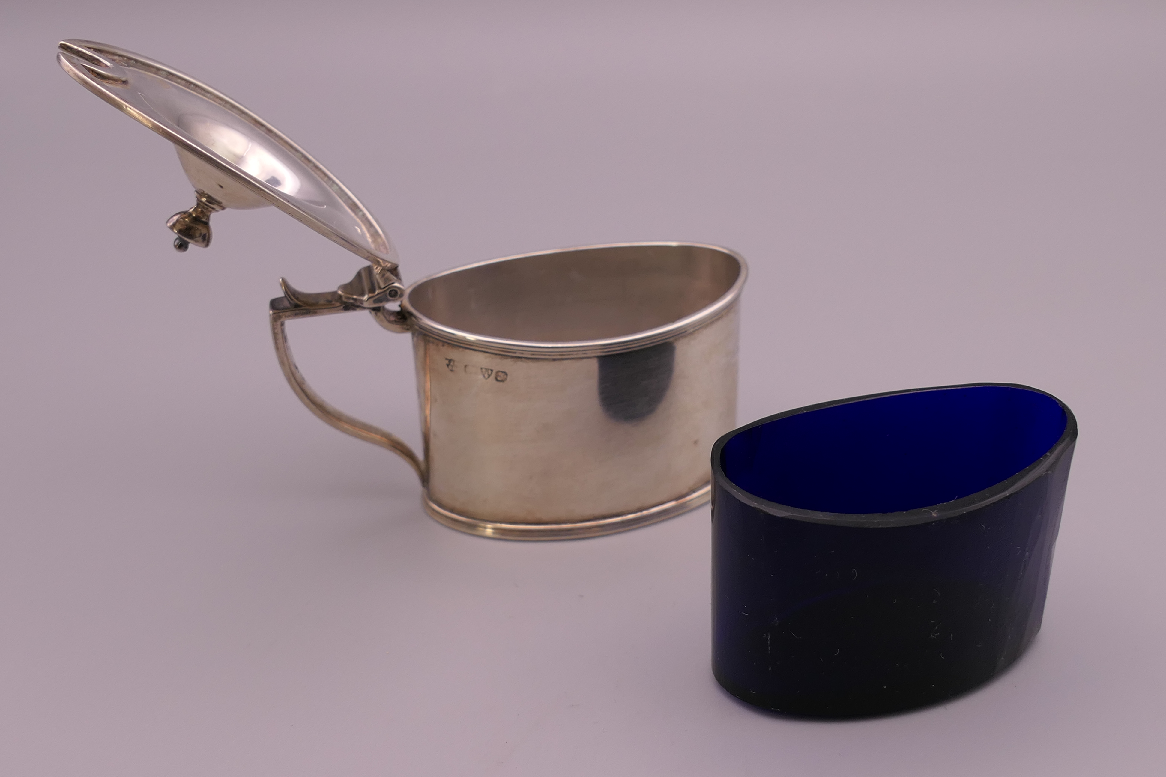A silver oval mustard with blue glass liner. 6 cm high. 67.1 grammes. - Image 5 of 6