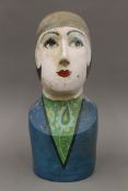 MOLLY MOSS, a painted female bust, signed to the underside and numbered 5. 42 cm high.