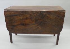 A 19th century mahogany drop leaf table. 100 cm long.