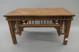 A Moroccan inlaid coffee table. 85.5 cm long.