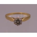 An 18 ct gold solitaire diamond (the stone .42 of a carat) ring. Ring size S/T. 2.