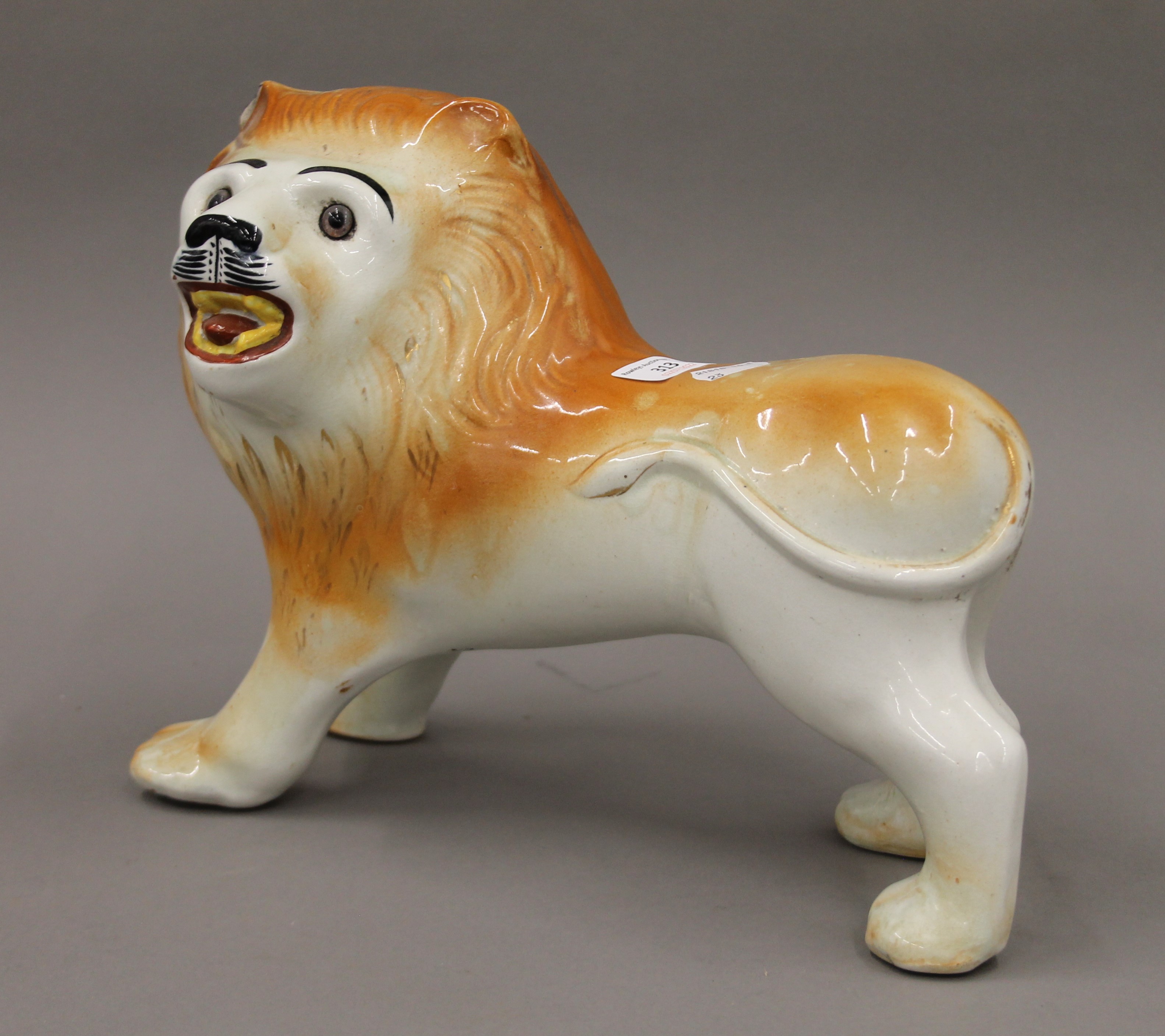 A Sadler pottery lion. 32.5 cm long. - Image 2 of 4