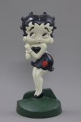 A cast iron model of Betty Boop. 35 cm high.