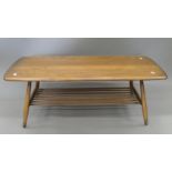 An Ercol coffee table. 104.5 cm long.