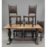 An early 20th century oak refectory table and five matching leather upholstered chairs.