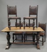 An early 20th century oak refectory table and five matching leather upholstered chairs.