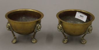 A pair of 19th century brass three footed bowls. 8.5 cm high.