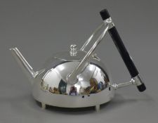 A Christopher Dresser style teapot. 14.5 cm high.