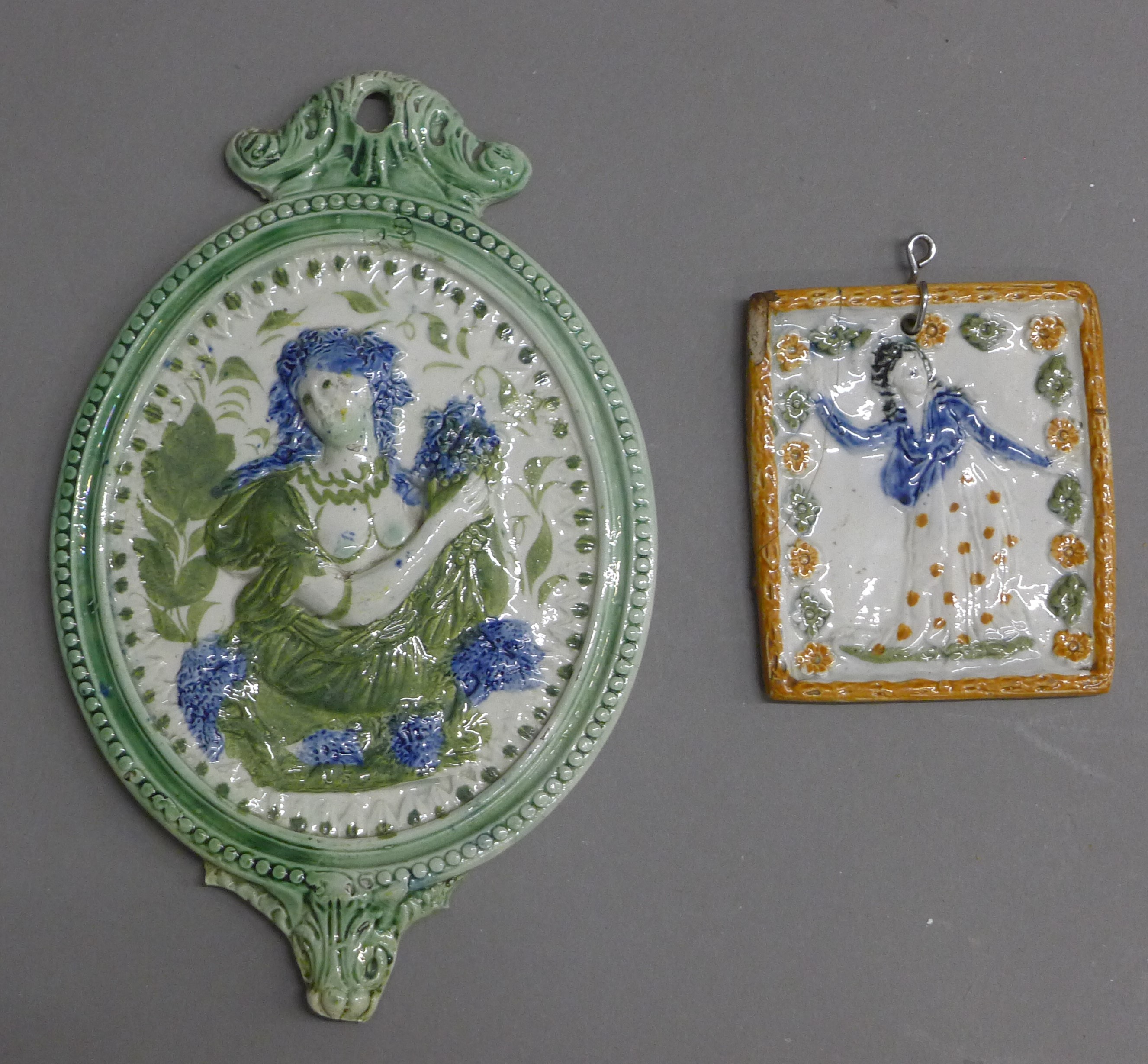 Two 19th century Prattware plaques. The largest 19.5 cm high.