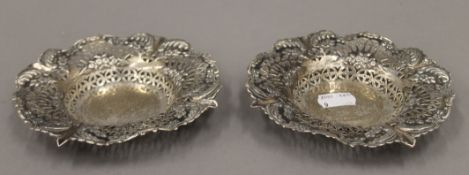 A pair of pierced silver bon-bon dishes. 14.5 cm diameter. 156.1 grammes.