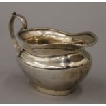 A silver jug. From the Robert Browning Settlement Collection Sale. 13.5 cm long. 158.9 grammes.