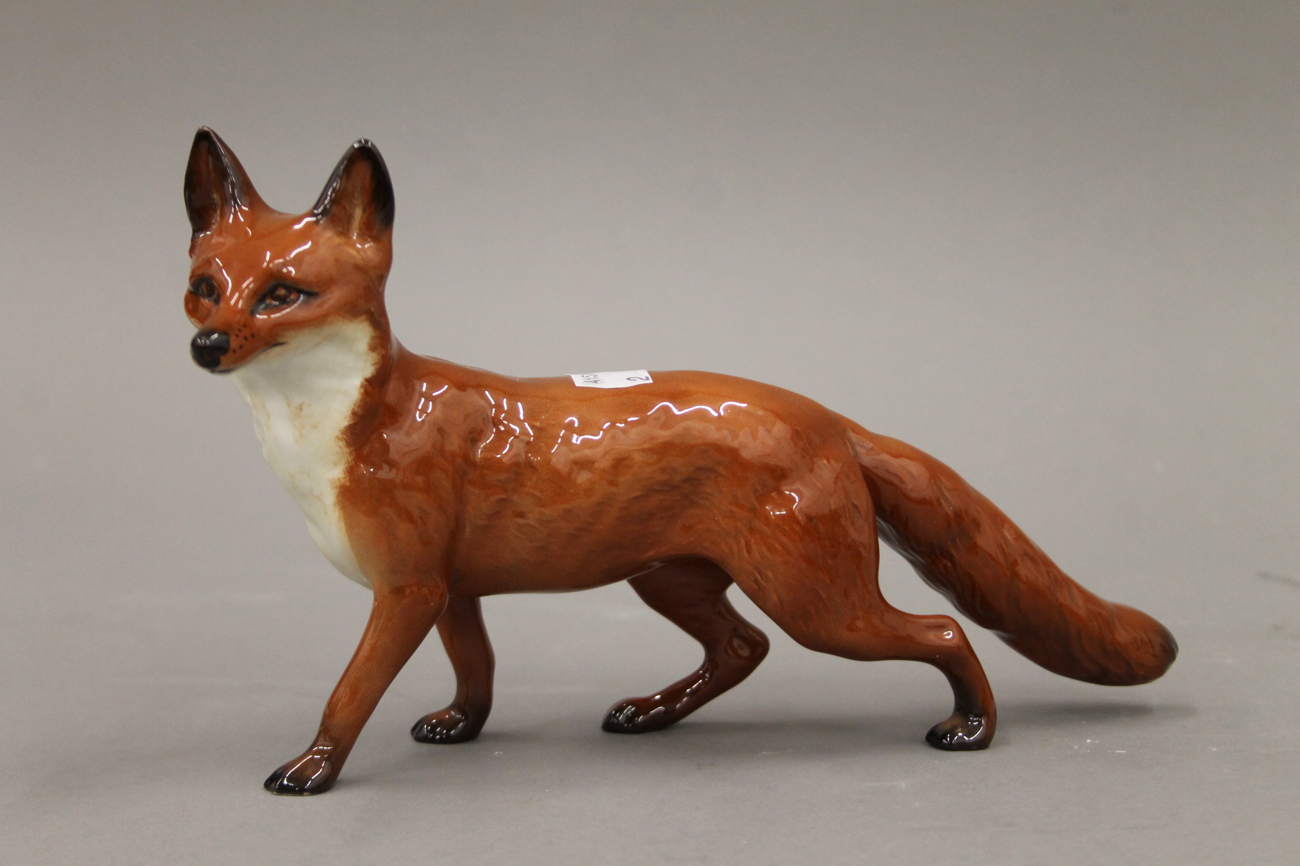 Two Beswick foxes, a pug dog, a wren and a Doulton dog. - Image 3 of 6