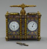 A double cloisonne carriage clock/barometer. 12.5 cm wide.