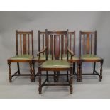 A set of five early 20th century oak dining chairs, including a carver.