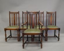 A set of five early 20th century oak dining chairs, including a carver.