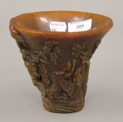 A libation cup. 13.5 cm high.