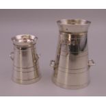 Two silver peppers formed as milk churns. 6 cm high and 4 cm high. 62.8 grammes.