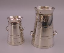 Two silver peppers formed as milk churns. 6 cm high and 4 cm high. 62.8 grammes.