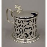 A pierced silver mustard pot. 7 cm high. 135.8 grammes.