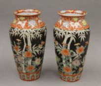 A pair of 19th century Japanese porcelain vases. 31.5 cm high.