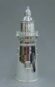 A silver plated cocktail shaker formed as a lighthouse. 33.5 cm high.