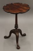 A Georgian and later mahogany tripod wine table. 57 cm high x 38 cm diameter.