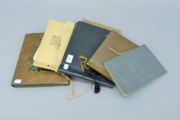 A postcard album and various photograph albums, including some military scenes.