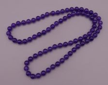 A bead necklace. 65 cm long.