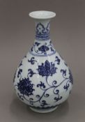 A Chinese blue and white porcelain bottle vase. 24 cm high.